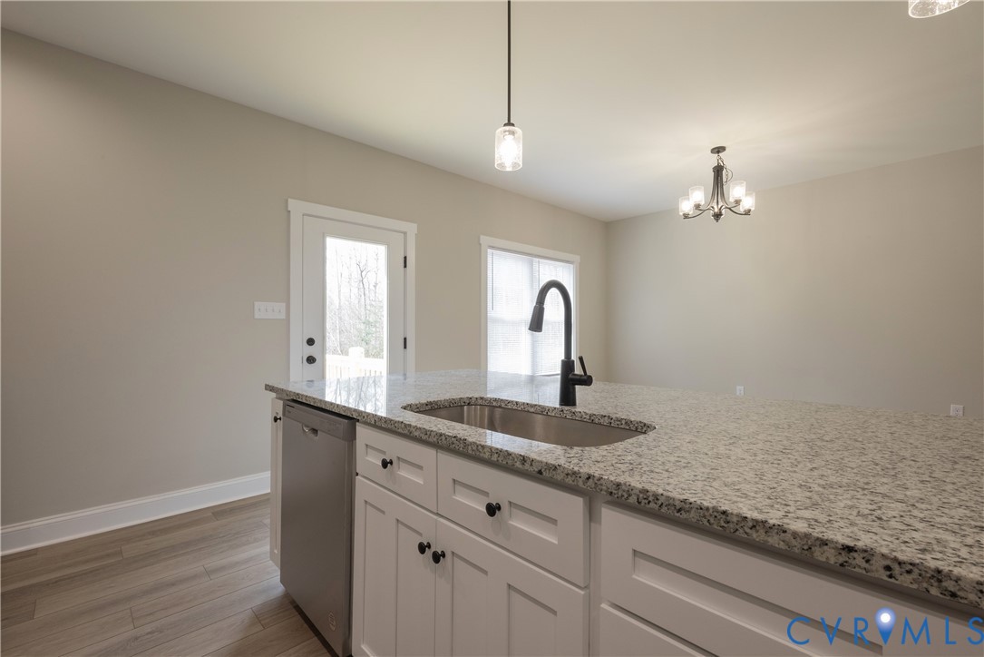 2223 Ridge Road Arvonia, VA 23004 - Photo 30 of 45 a kitchen with sink and mirror