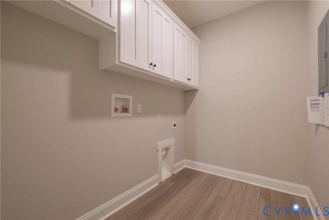 2223 Ridge Road Arvonia, VA 23004 - Photo 36 of 45 a view of storage and utility room with wooden floor