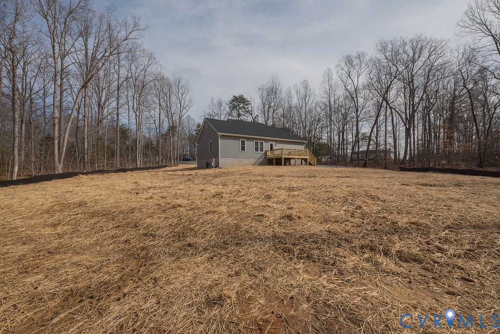 2223 Ridge Road Arvonia, VA 23004 - Photo 40 of 45 a view of a house with a yard
