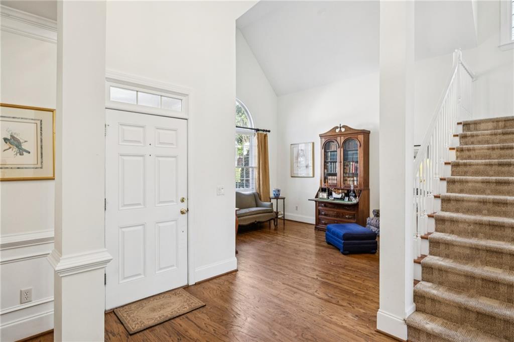 1055 Brookhaven Walk Northeast Atlanta, GA 30319 - Photo 11 of 40 a view of a living room with furniture and wooden floor