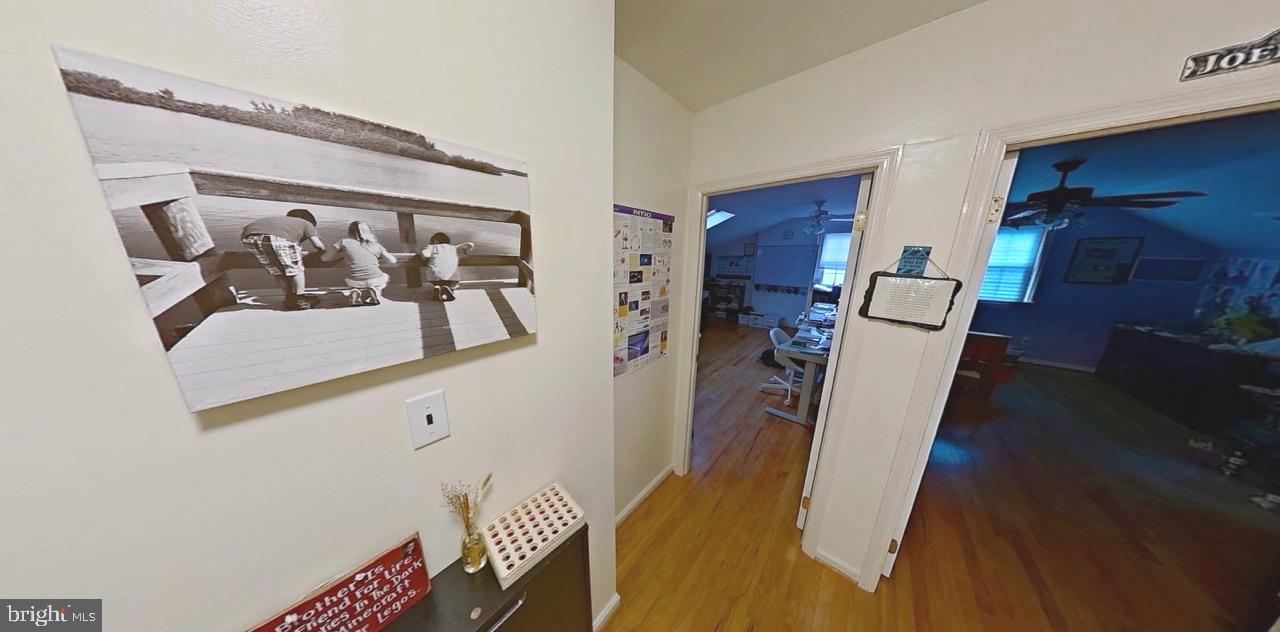 2418 Marilyn Drive Wilmington, DE 19810 - Photo 13 of 46 a view of walk in closet with clothes and shoes