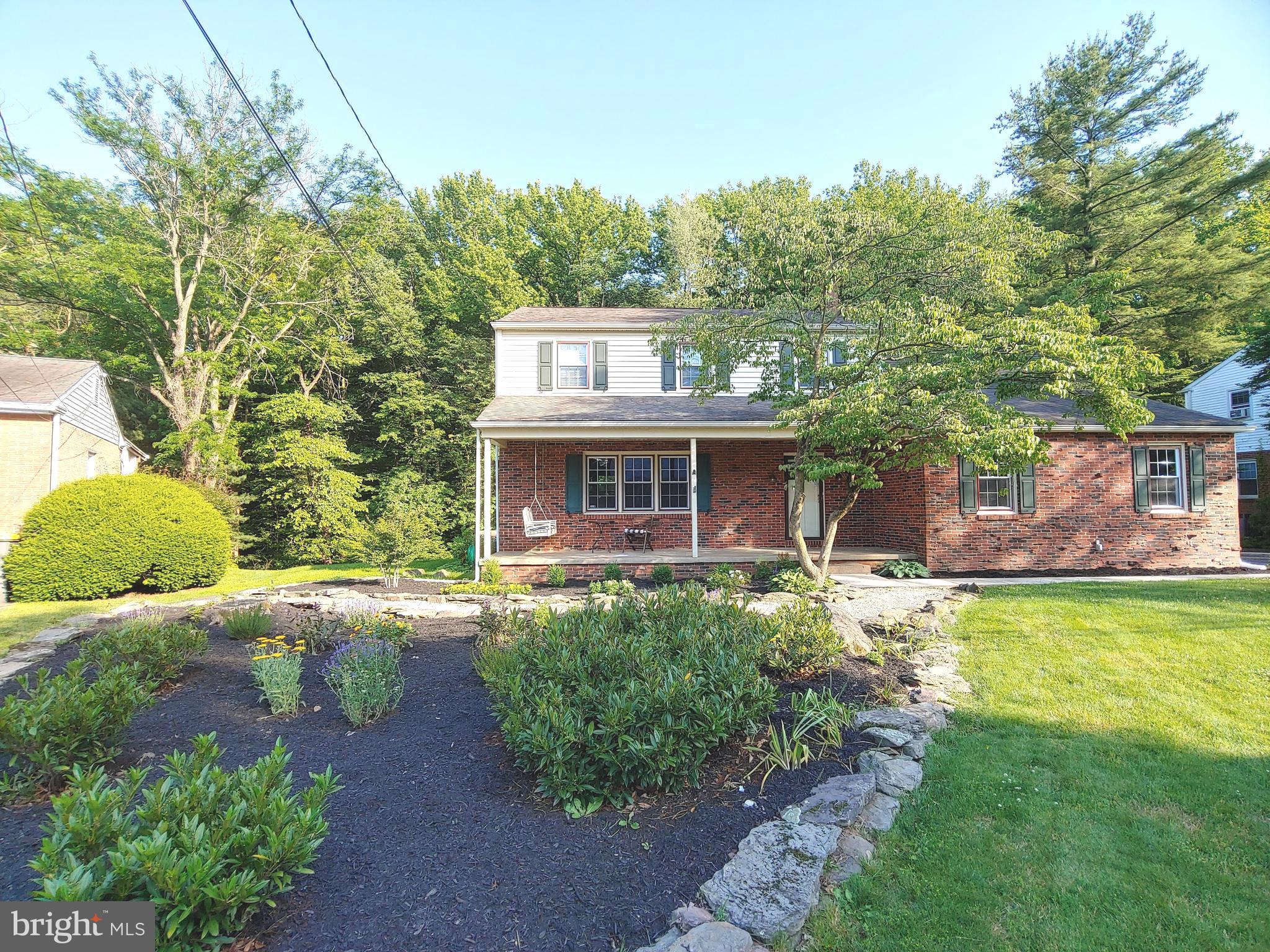 2418 Marilyn Drive Wilmington, DE 19810 - Photo 2 of 46 a front view of a house with garden