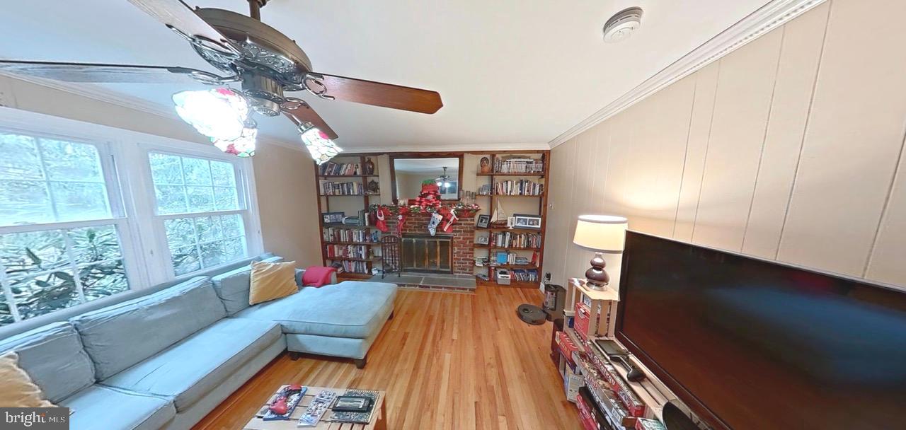 2418 Marilyn Drive Wilmington, DE 19810 - Photo 30 of 46 a living room with furniture and a flat screen tv