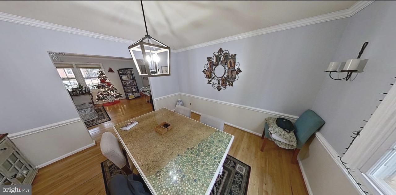 2418 Marilyn Drive Wilmington, DE 19810 - Photo 8 of 46 a view of a dining room with furniture wooden floor and chandelier