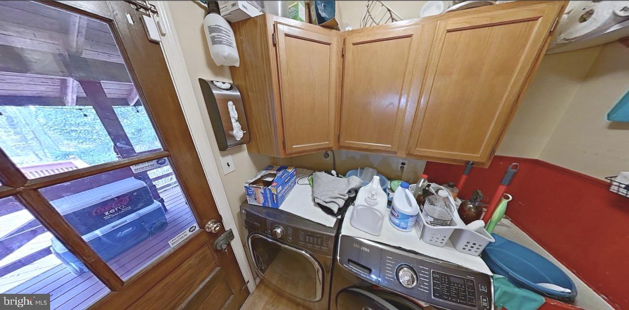 2418 Marilyn Drive Wilmington, DE 19810 - Photo 9 of 46 a view of walk in closet with clothes and shoes