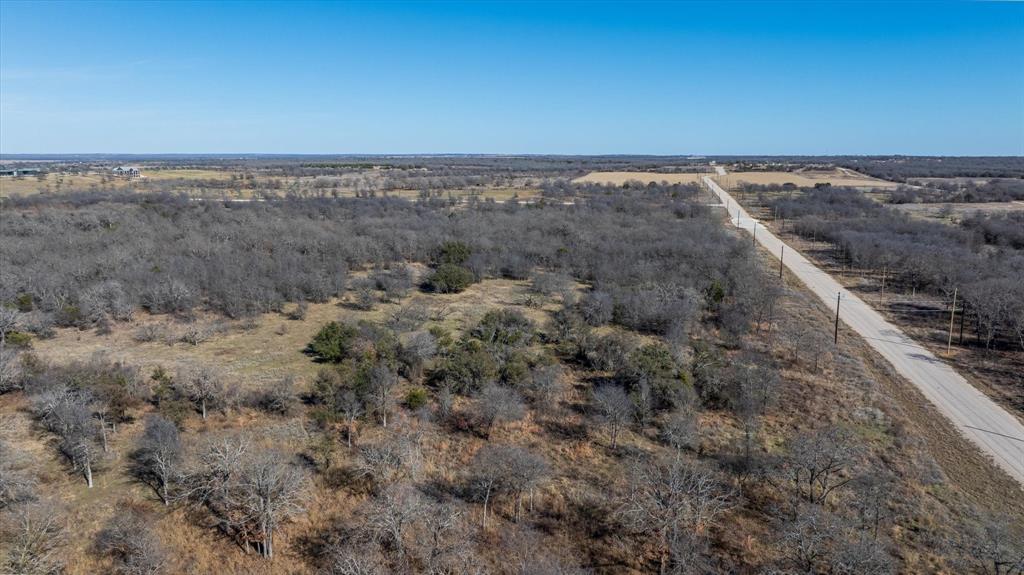 Lot 27 Paradise Oaks Ranch Perrin, TX 76486 - Photo 16 of 21 an aerial view of a house