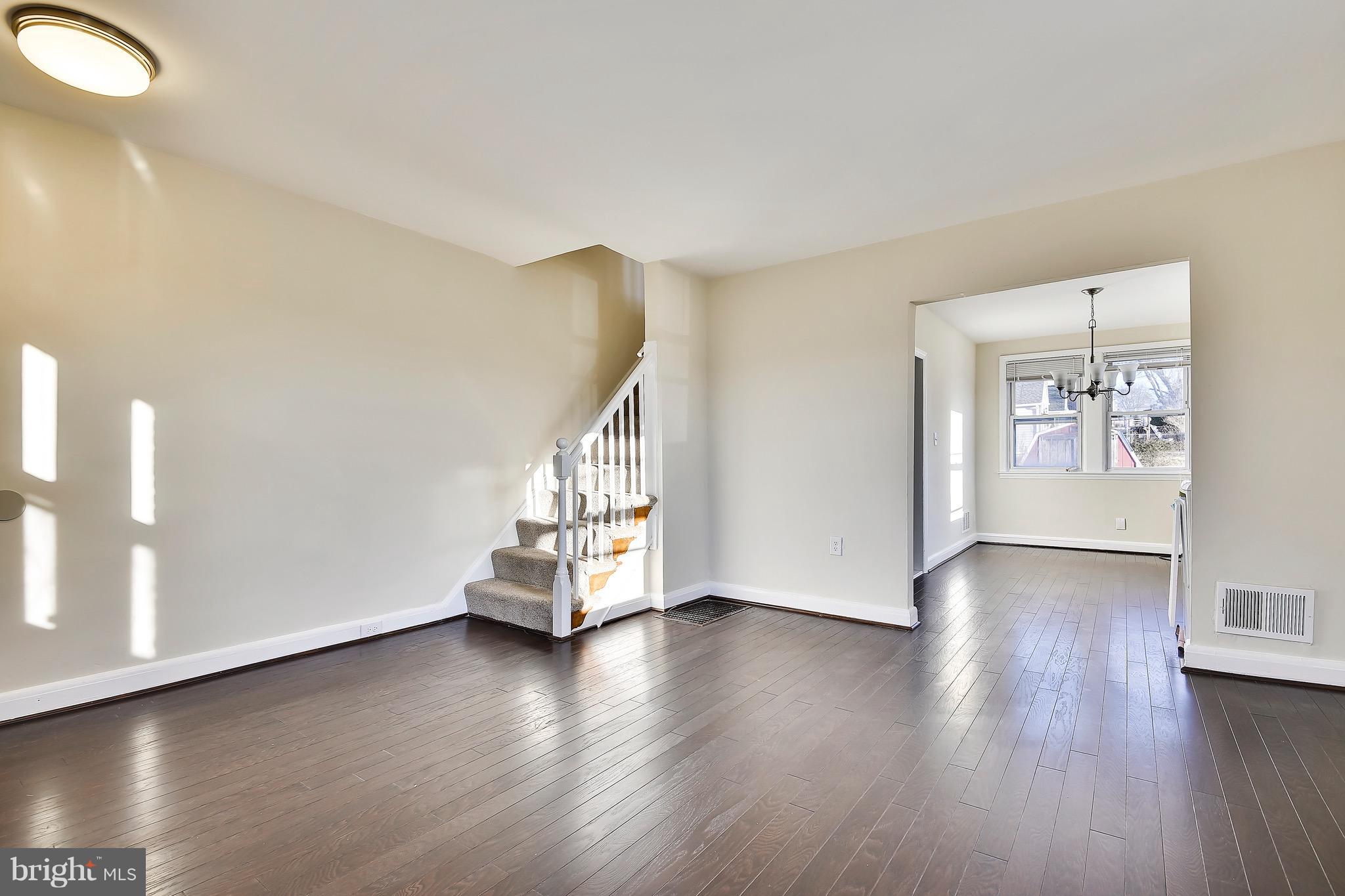 227 Old Riverside Road Baltimore, MD 21225 - Photo 1 of 20 a view of a room with wooden floor