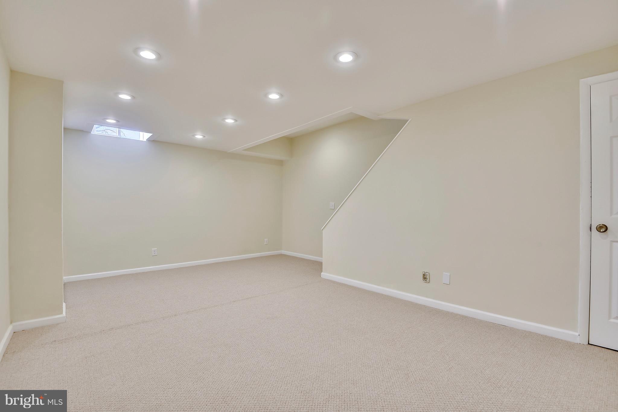 227 Old Riverside Road Baltimore, MD 21225 - Photo 12 of 20 an empty room with a empty space and window
