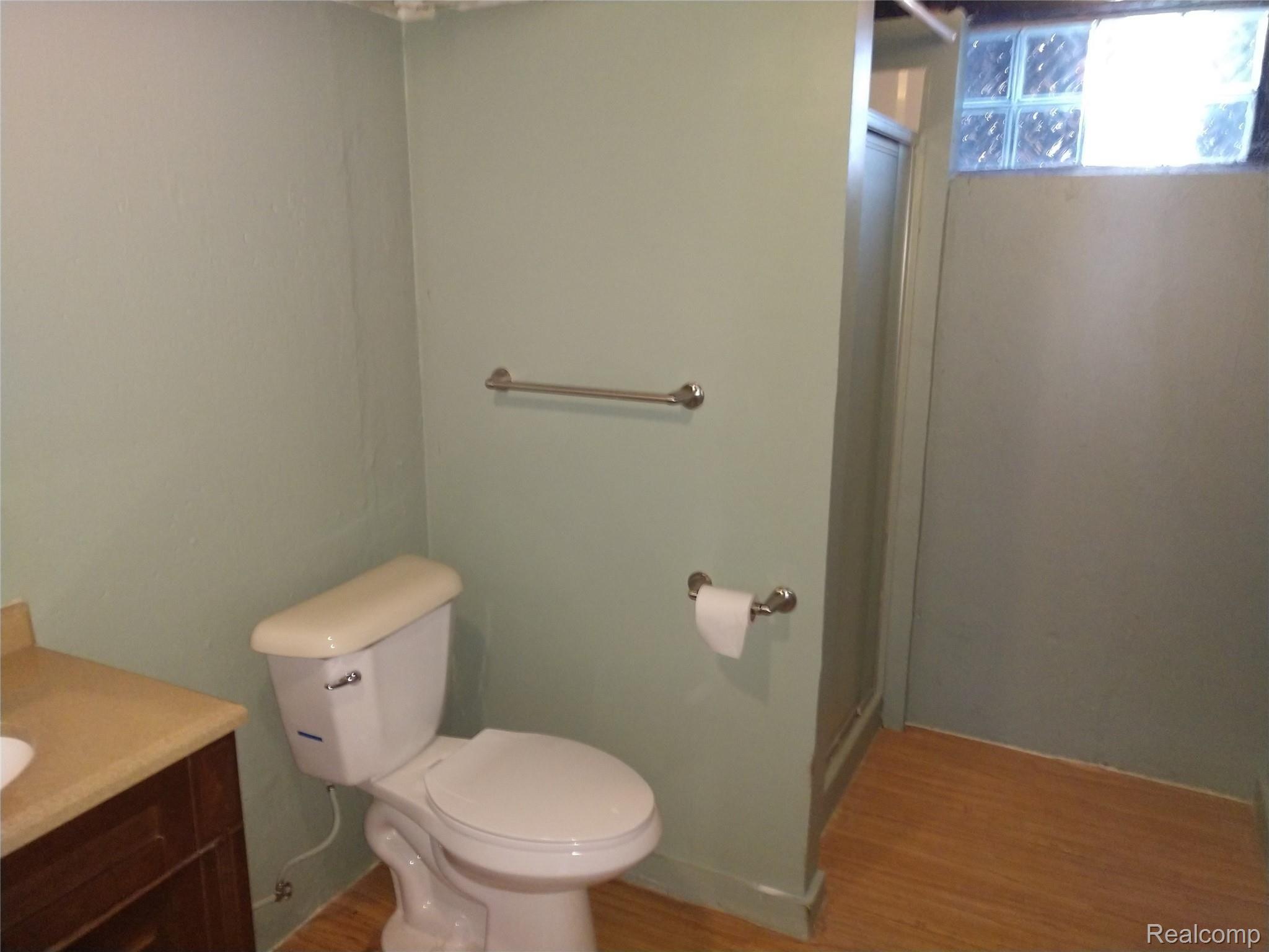 9820 Ruth Avenue Allen Park, MI 48101 - Photo 16 of 19 VERY NICELY DONE THREE PIECE BATH WITH SHOWER, COMMODE AND SINK ALL REMODELED.