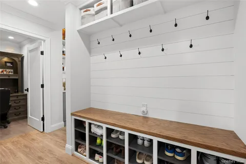 a view of kitchen with cabinets