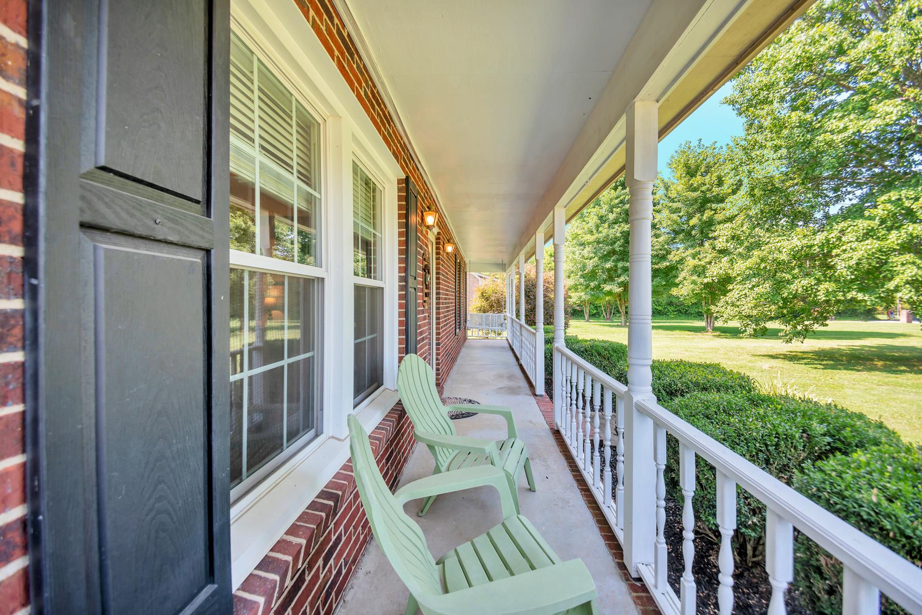 Cozy covered front porch.