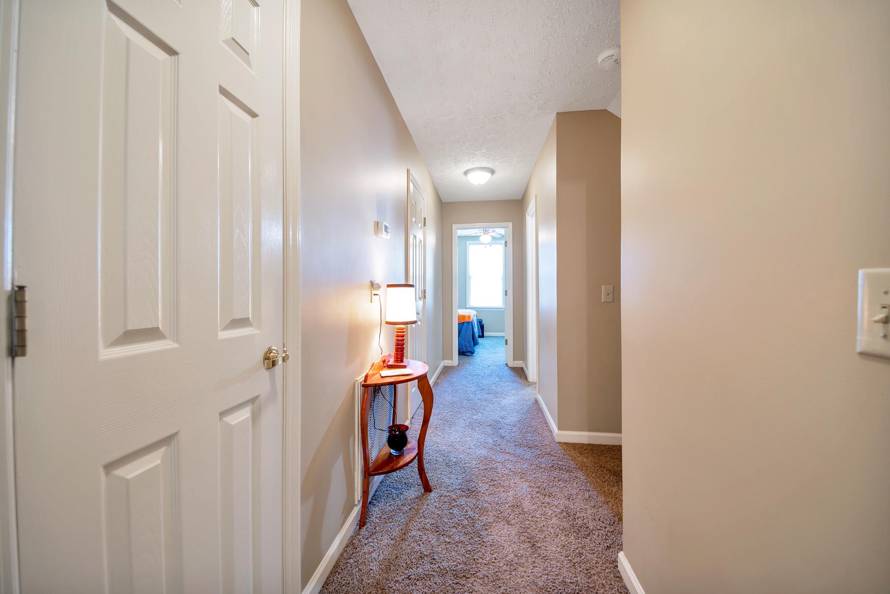 1115 Kathryn Road Mount Juliet, TN 37122 - Photo 16 of 21 Upstairs hallway. Doors to left open to large joined storage closet.