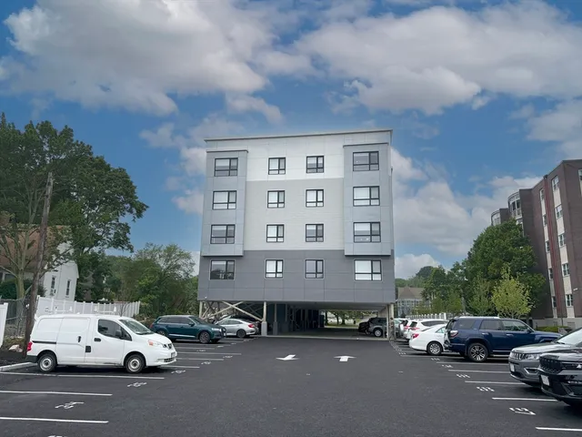 a car parked in front of a building
