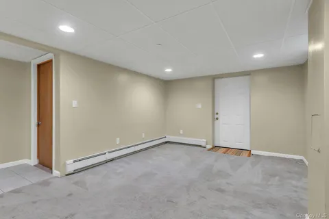 a bathroom with a sink a toilet and bathtub