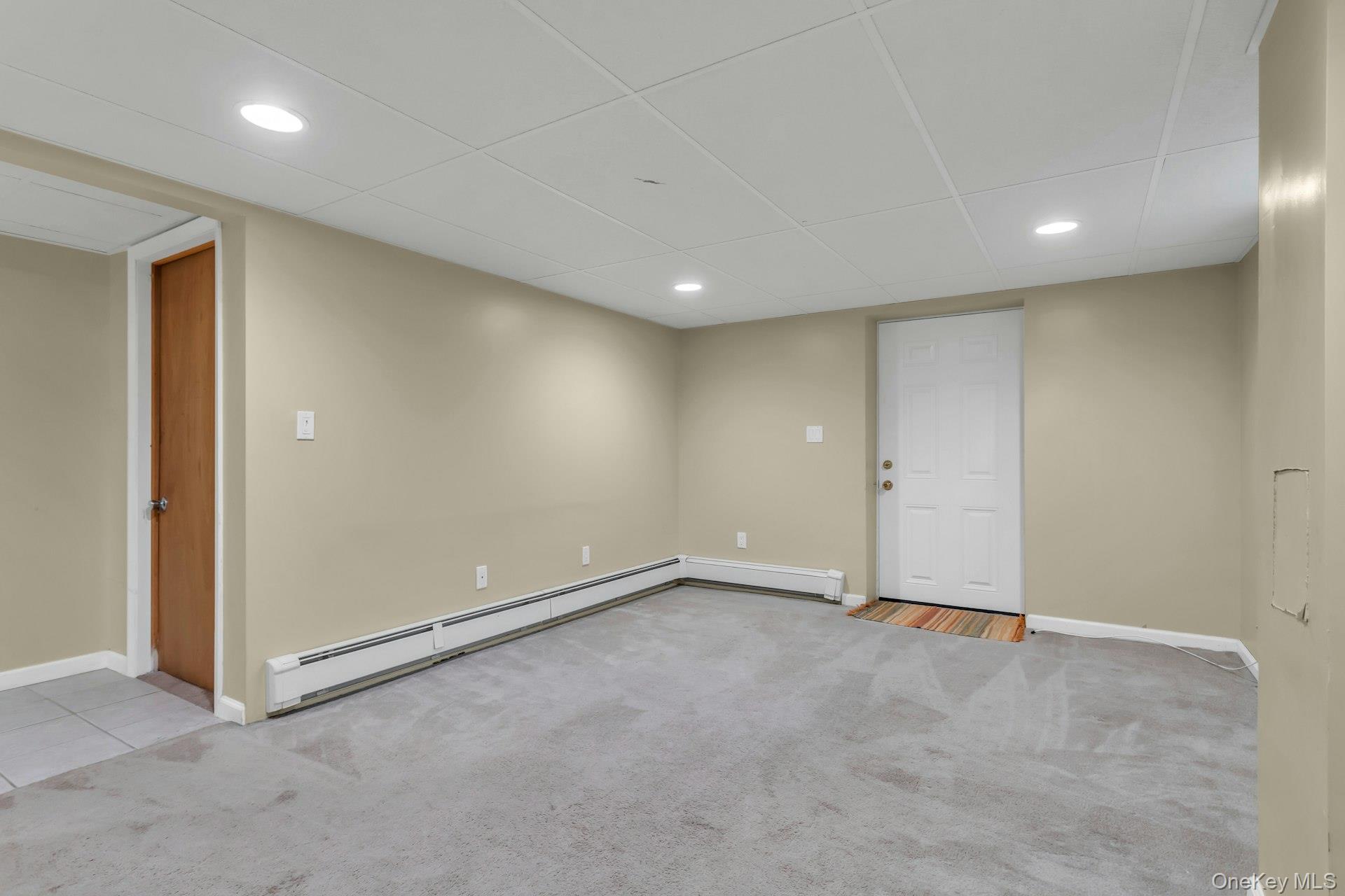 4 Timber Road Glen Cove, NY 11542 - Photo 23 of 30 an empty room with an entryway