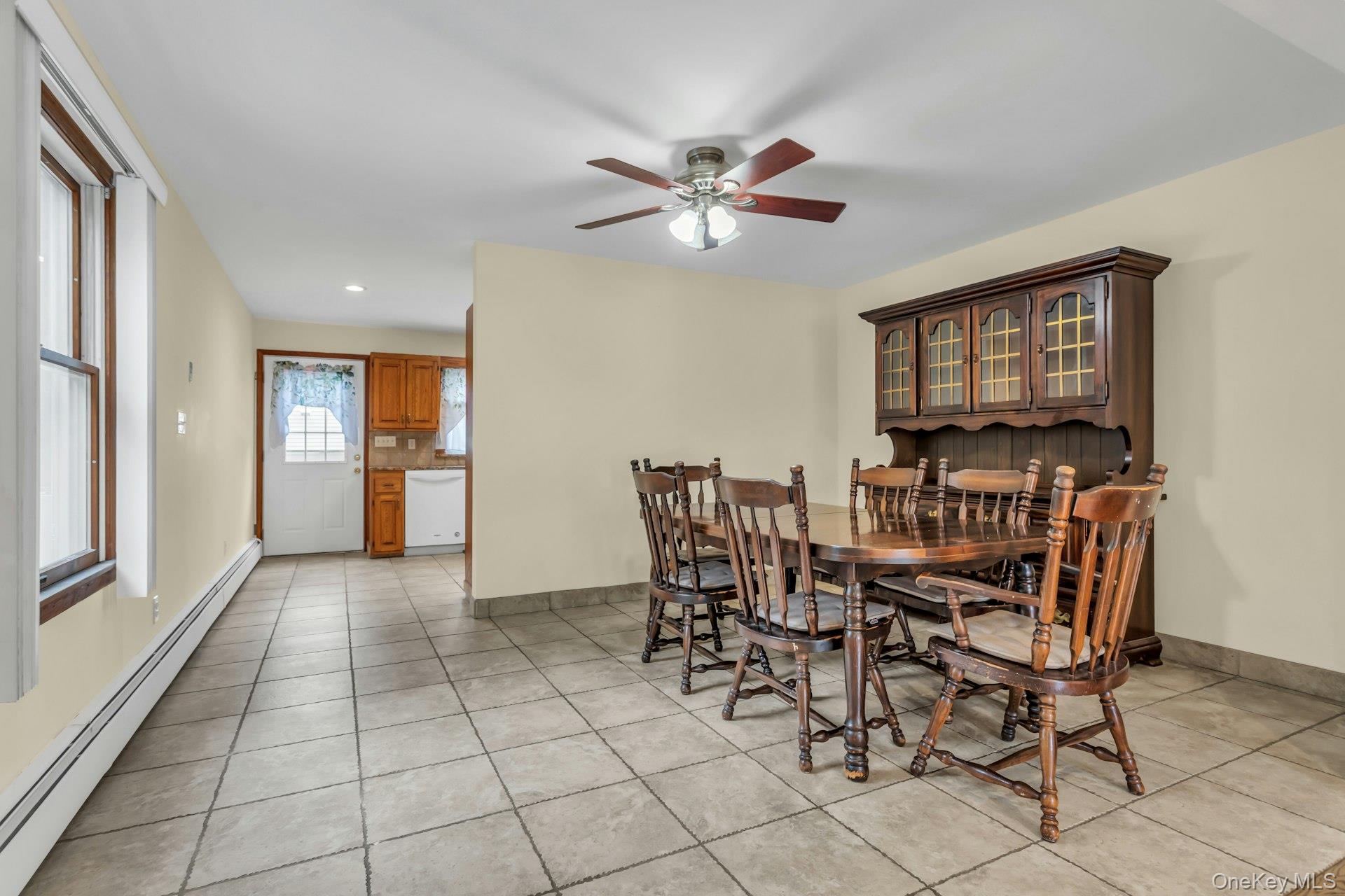 4 Timber Road Glen Cove, NY 11542 - Photo 6 of 30 a view of a dining room with furniture and chandelier