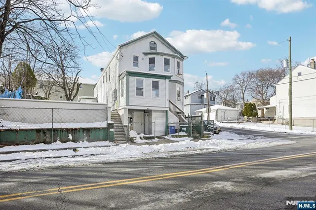 a view of a building with a street