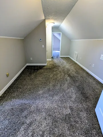 a view of a big room with wooden floor