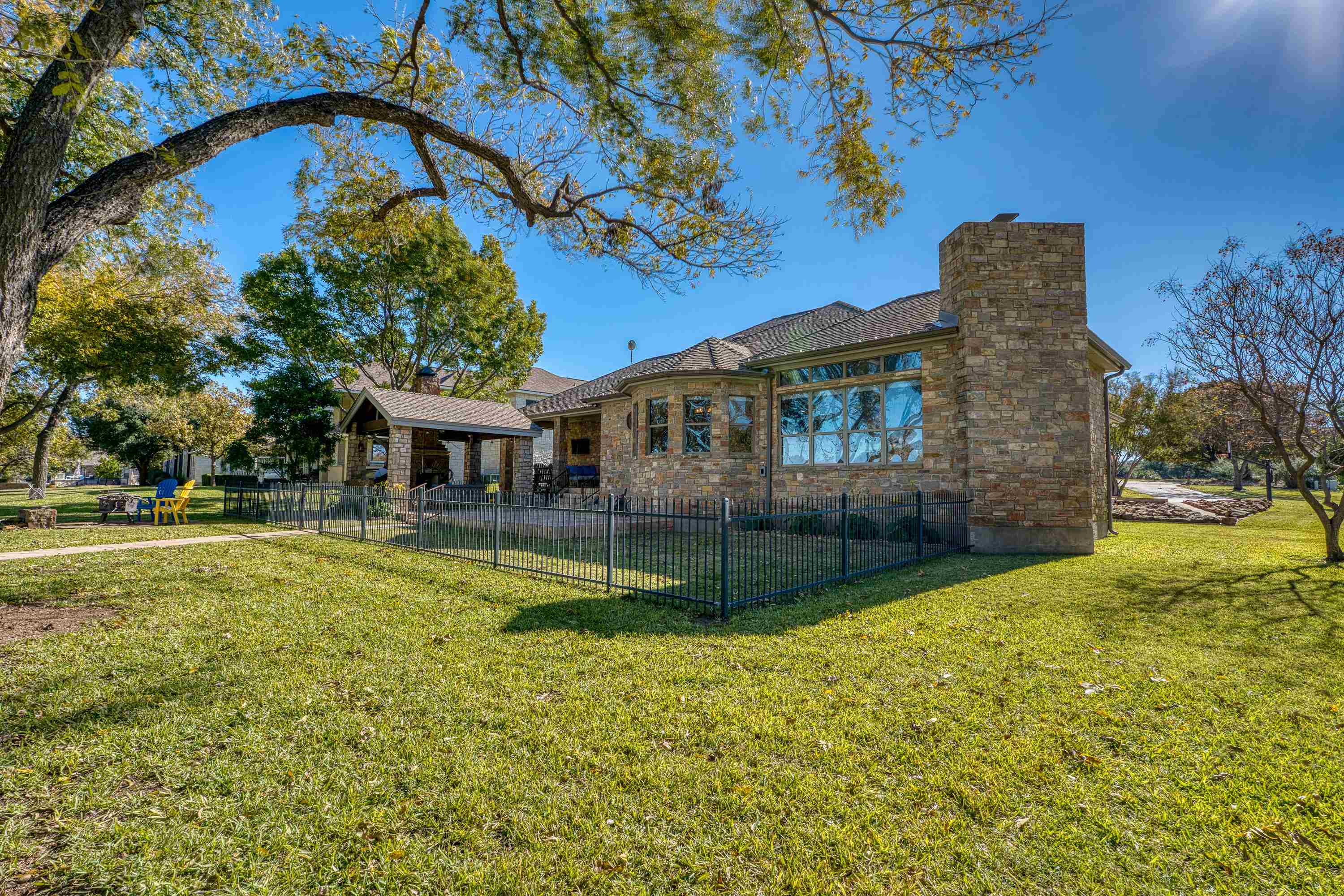 206 River Ranch Road Kingsland, TX 78639 - Photo 24 of 30 a view of a house with a swimming pool