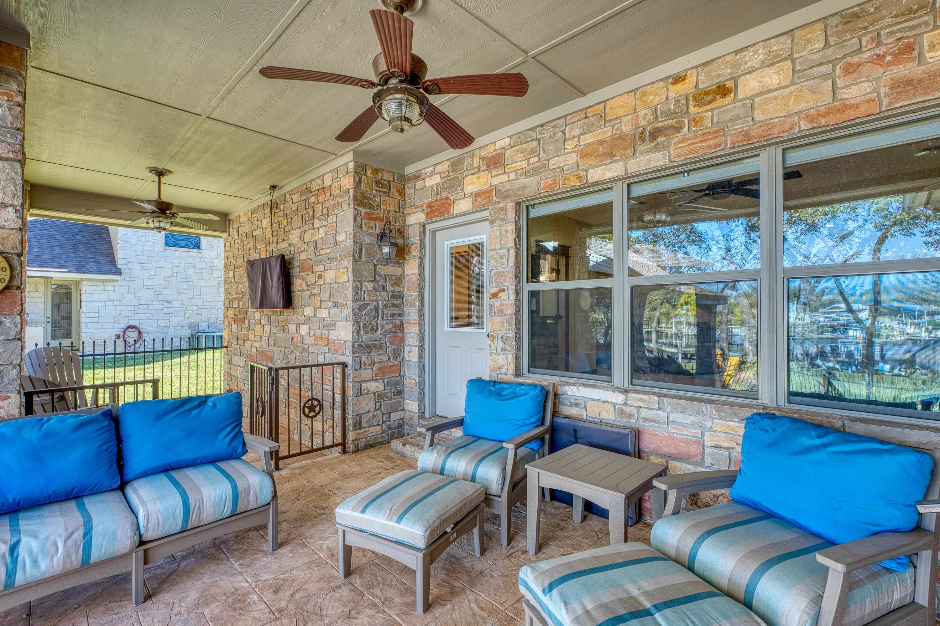 206 River Ranch Road Kingsland, TX 78639 - Photo 25 of 30 a living room with furniture and a large window
