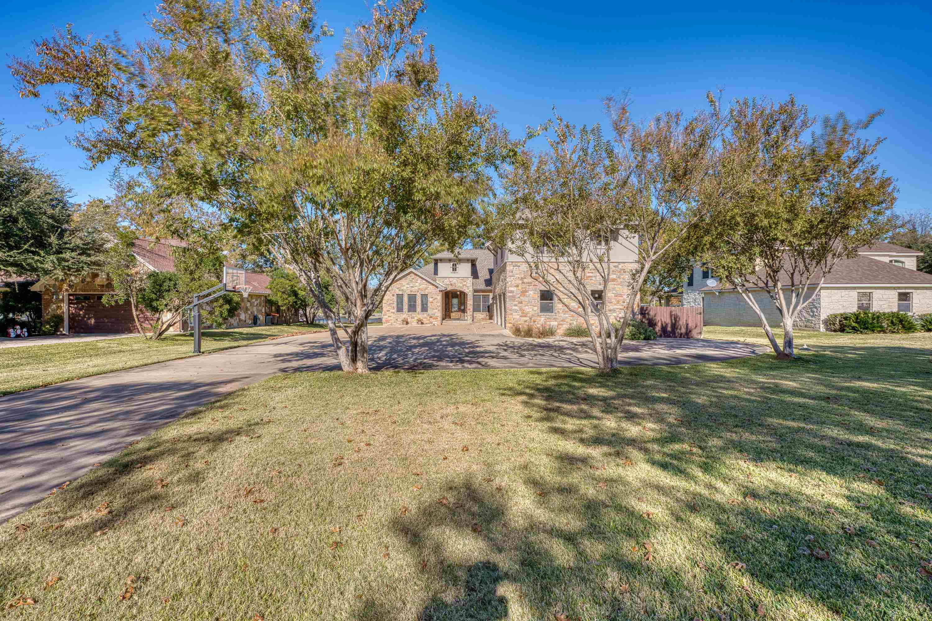 206 River Ranch Road Kingsland, TX 78639 - Photo 6 of 30 a front view of a house with a yard