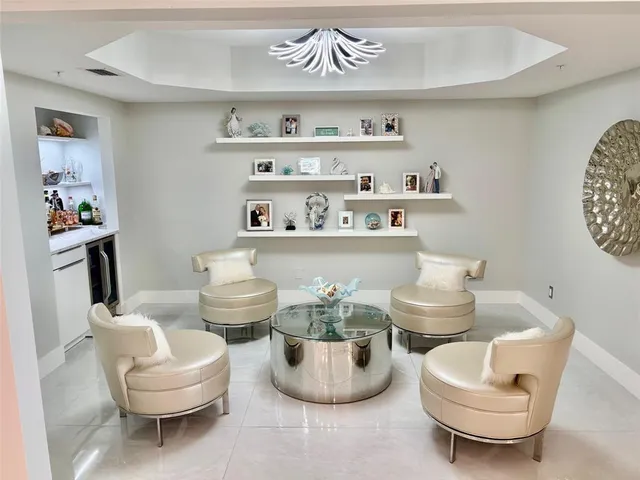 a living room with furniture and decor