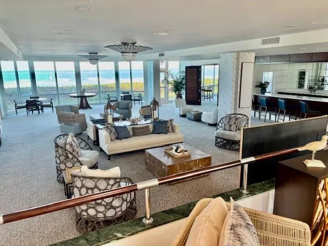 a living room with furniture and a table