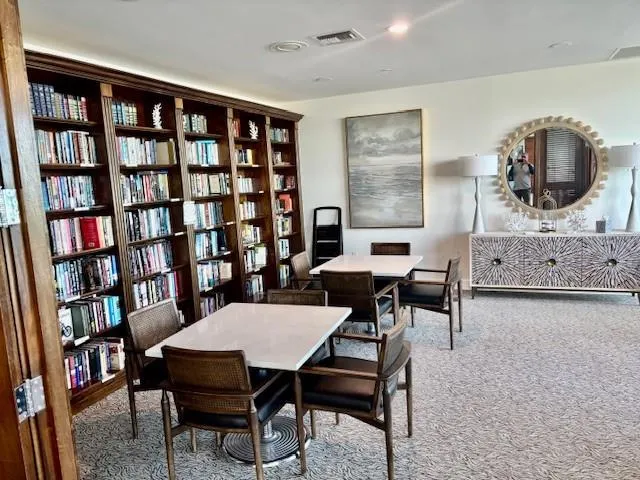 a view of a workspace with furniture