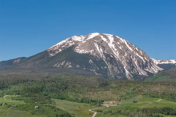 a view of a city with a mountain