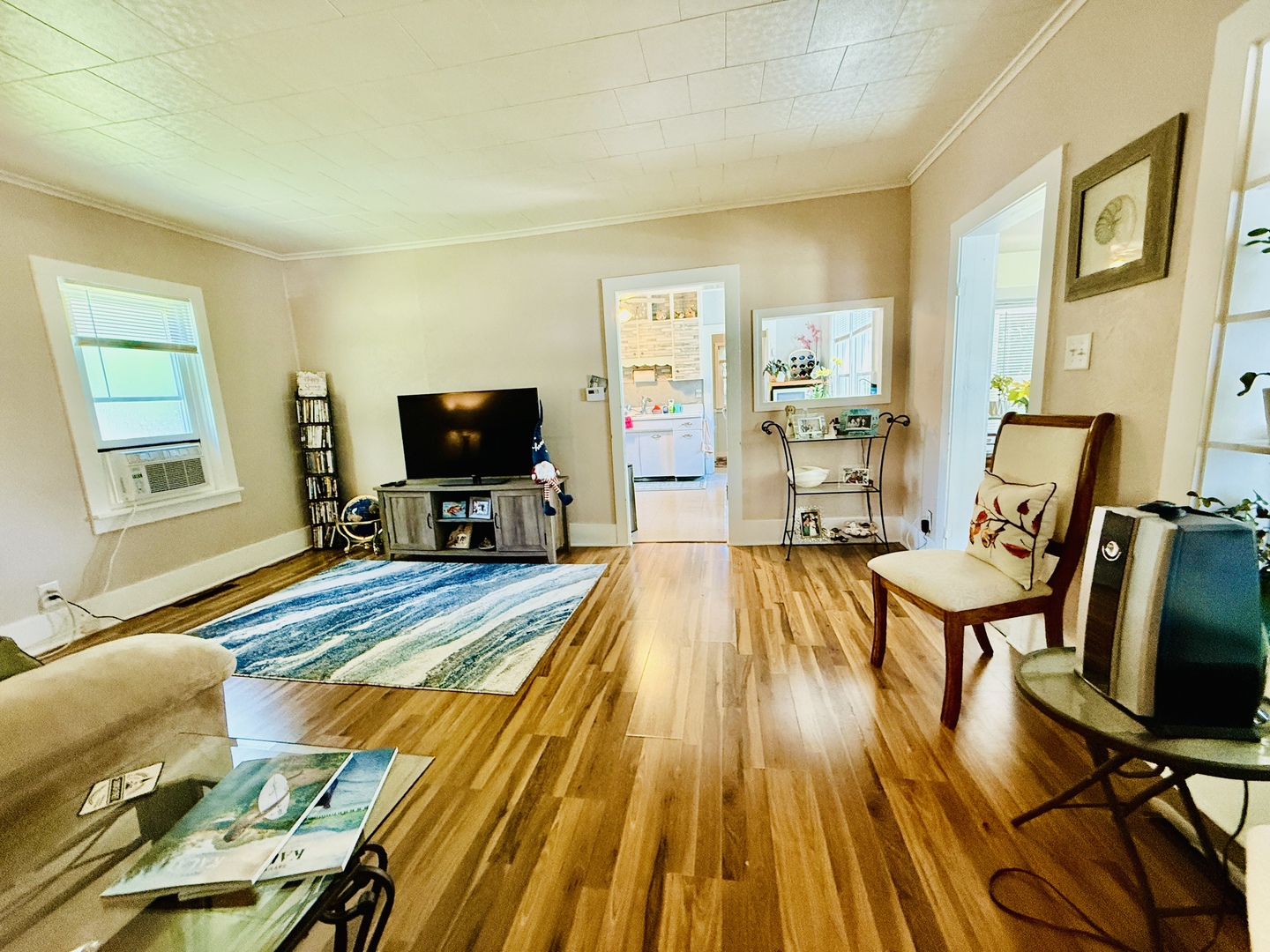 423 Maple Street Marengo, IL 60152 - Photo 12 of 17 a living room with furniture and a flat screen tv
