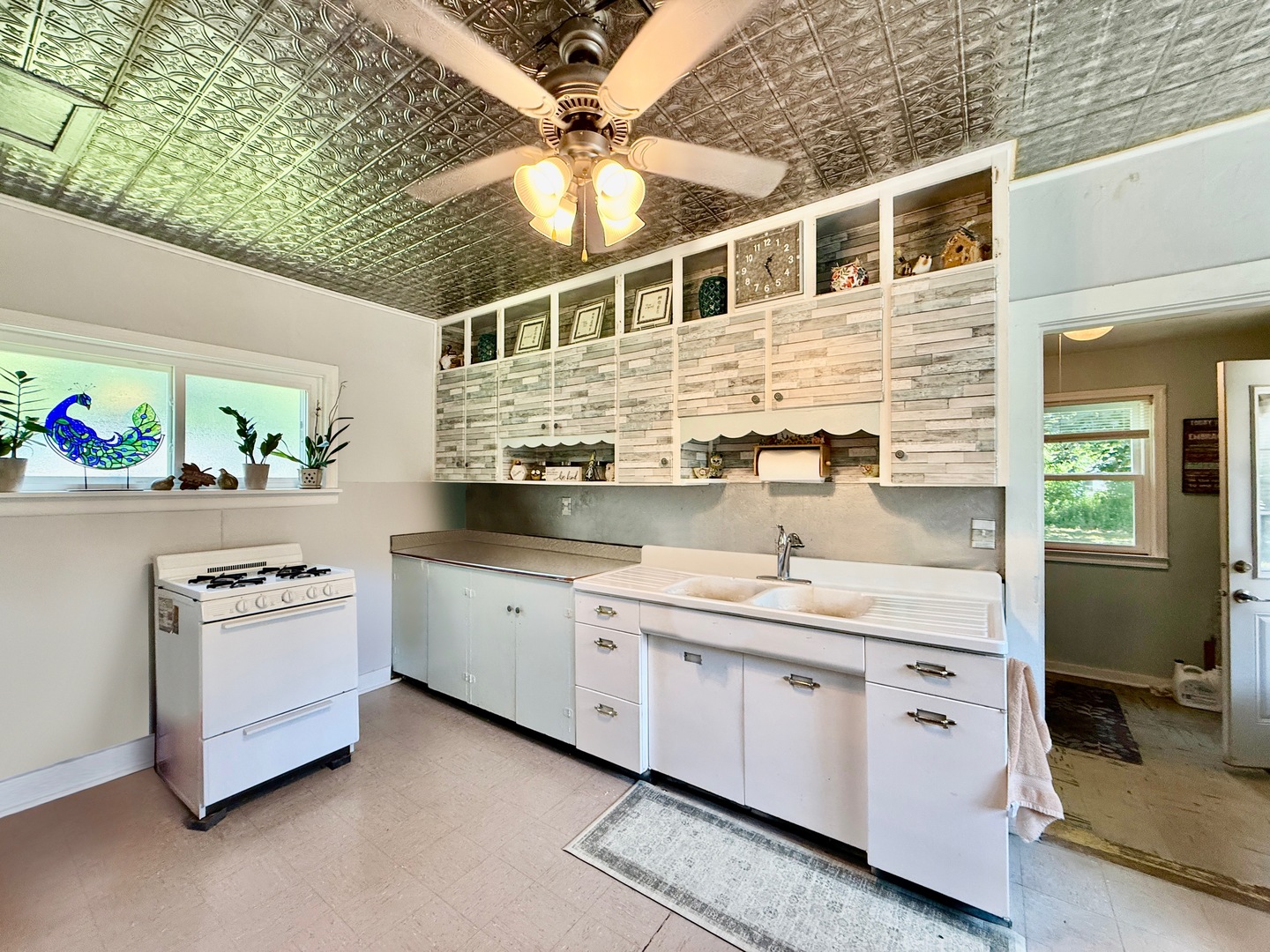 423 Maple Street Marengo, IL 60152 - Photo 13 of 17 a kitchen with stainless steel appliances granite countertop a sink and cabinets