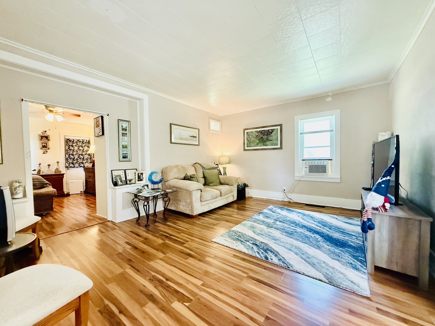 423 Maple Street Marengo, IL 60152 - Photo 7 of 17 a living room with furniture and a flat screen tv