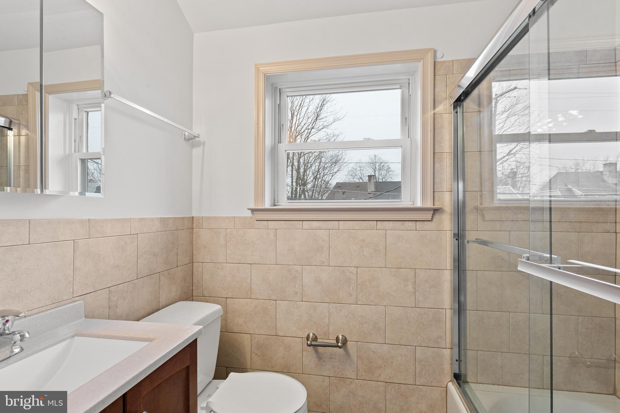 74 Kinship Road Dundalk, MD 21222 - Photo 17 of 29 Full Bath with glass enclosed tub/shower