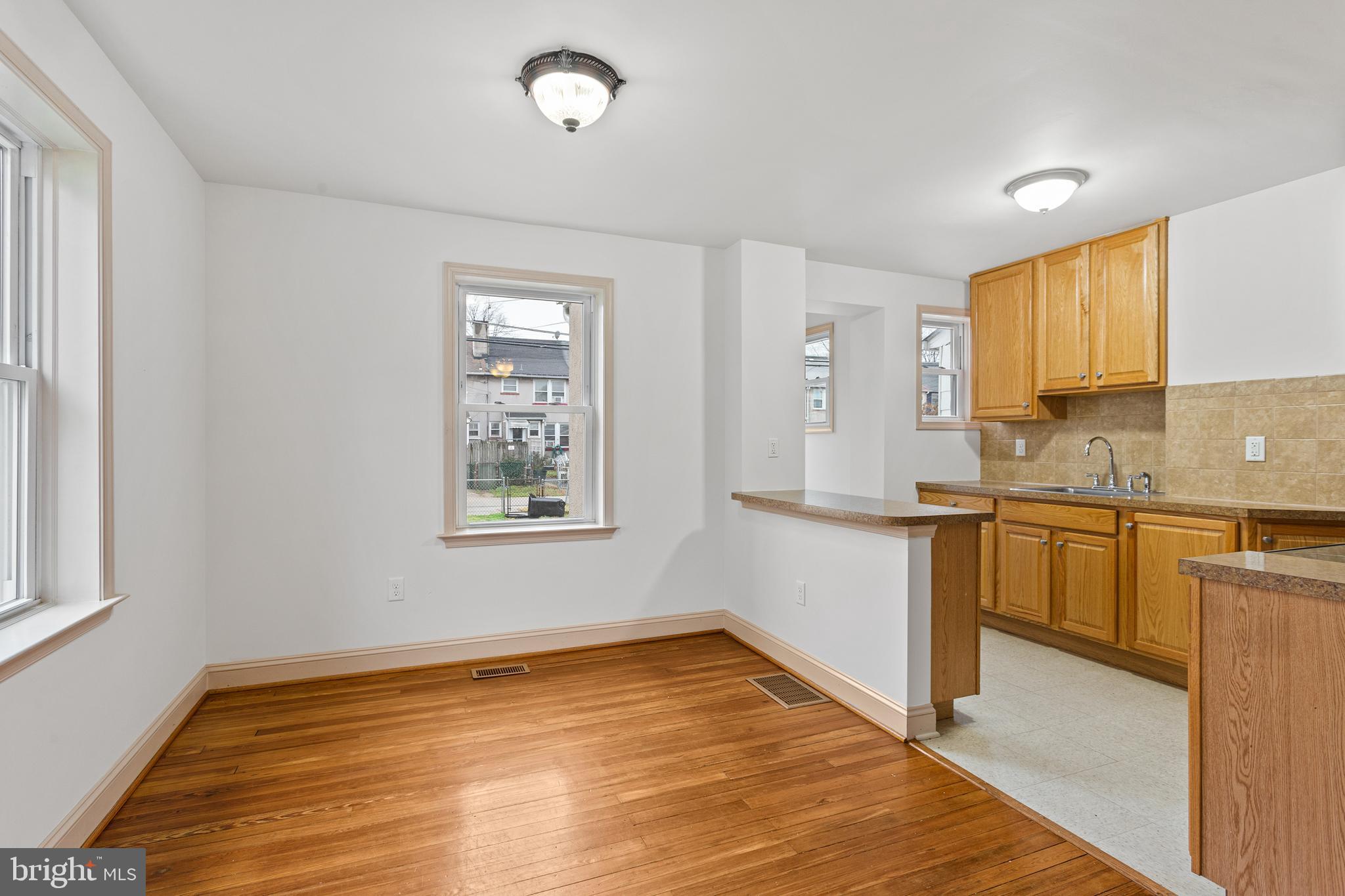 74 Kinship Road Dundalk, MD 21222 - Photo 6 of 29 Dining Room with Hardwood Flooring