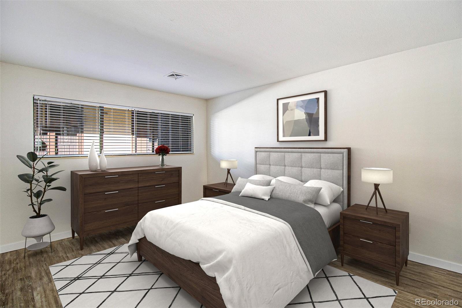 500 Manhattan Drive, Unit B1 Boulder, CO 80303 - Photo 12 of 24 a bedroom with a bed and a dresser