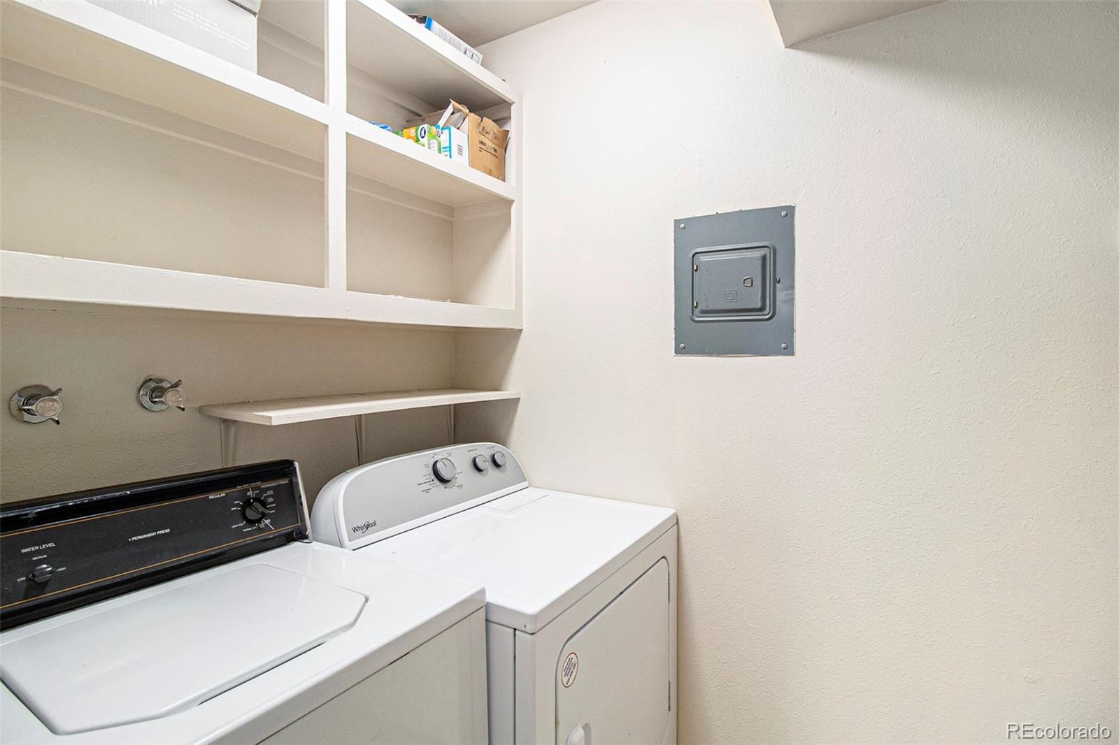 500 Manhattan Drive, Unit B1 Boulder, CO 80303 - Photo 20 of 24 a utility room with dryer and washer