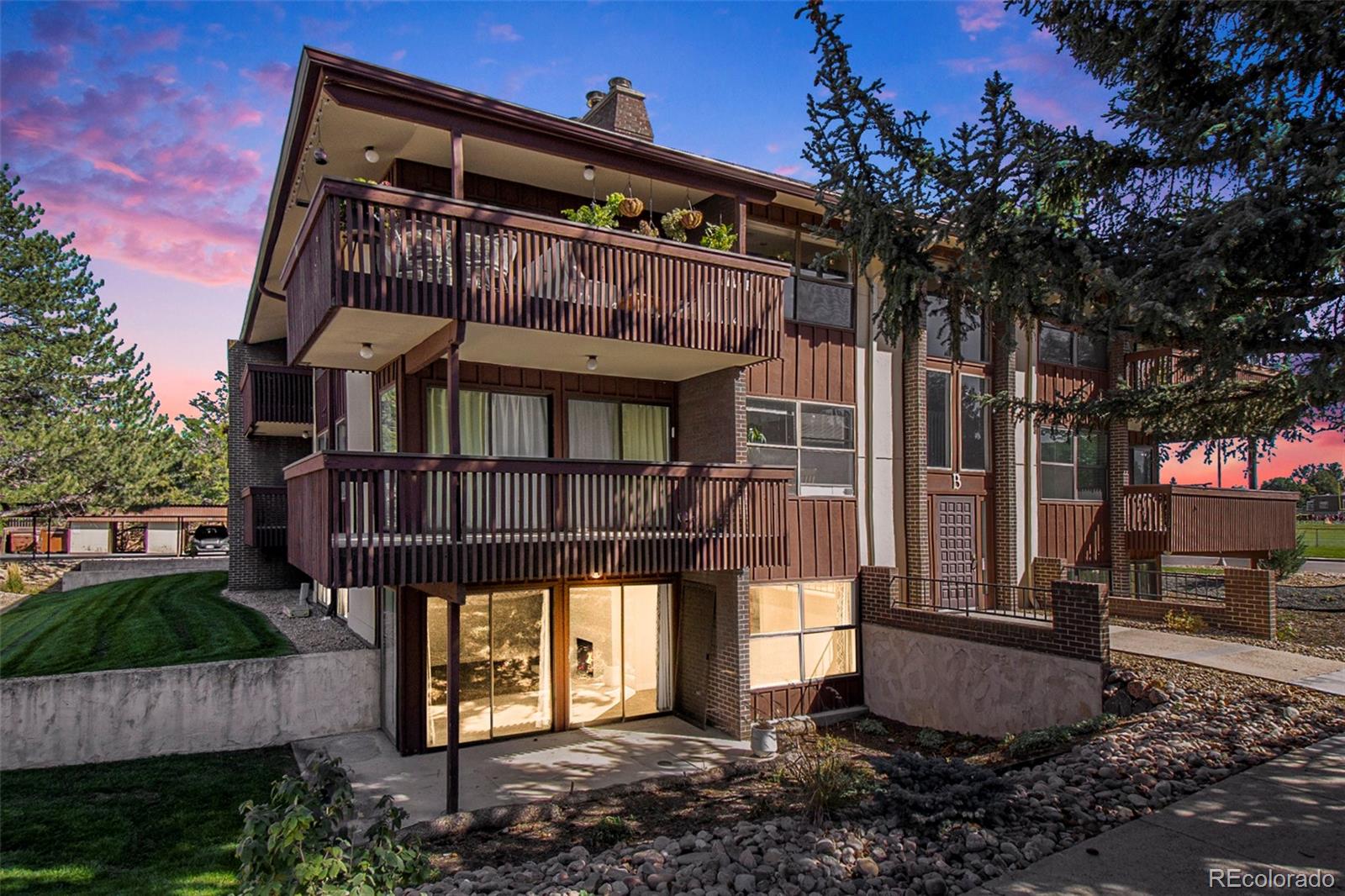 500 Manhattan Drive, Unit B1 Boulder, CO 80303 - Photo 2 of 24 a view of a house with a yard