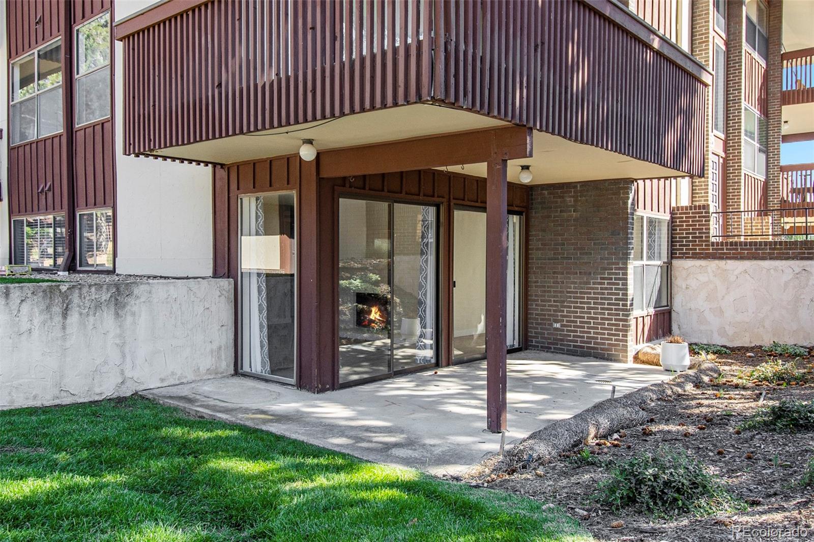 500 Manhattan Drive, Unit B1 Boulder, CO 80303 - Photo 21 of 24 a front view of a house with garden