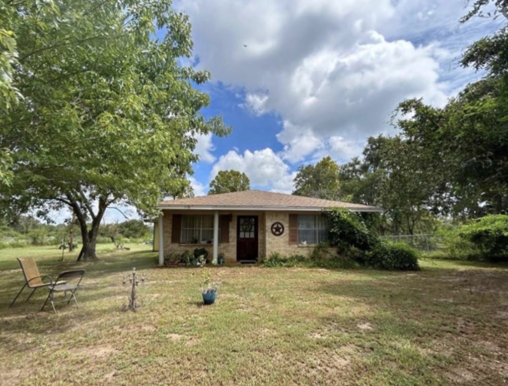 8351 Farm To Market 3 Marquez, TX 77865 - Photo 1 of 8 a front view of a house with a yard