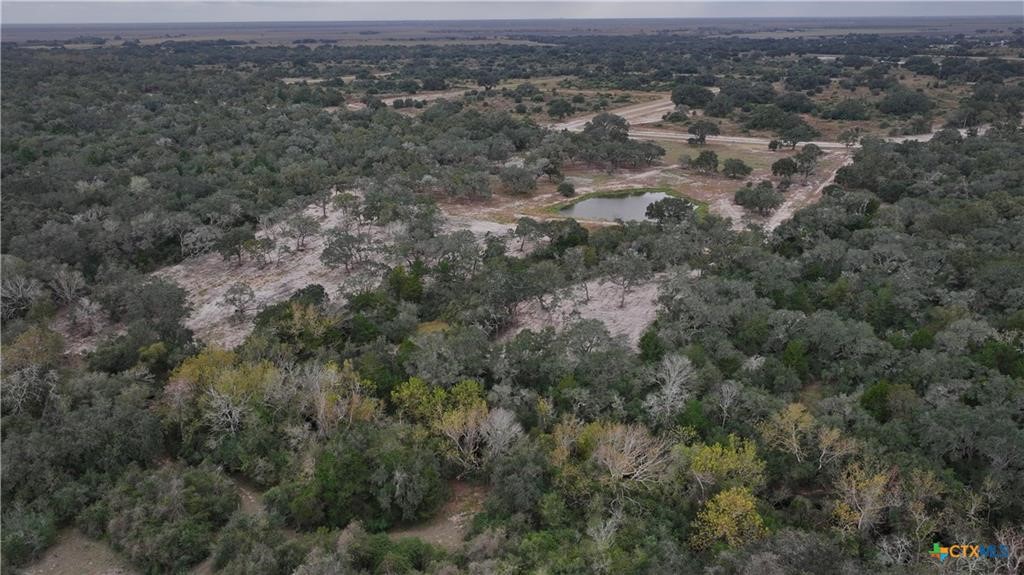 0 Garcitas Crk Rnch Road Inez, TX 77968 - Photo 12 of 13 an aerial view of residential houses with outdoor space and trees