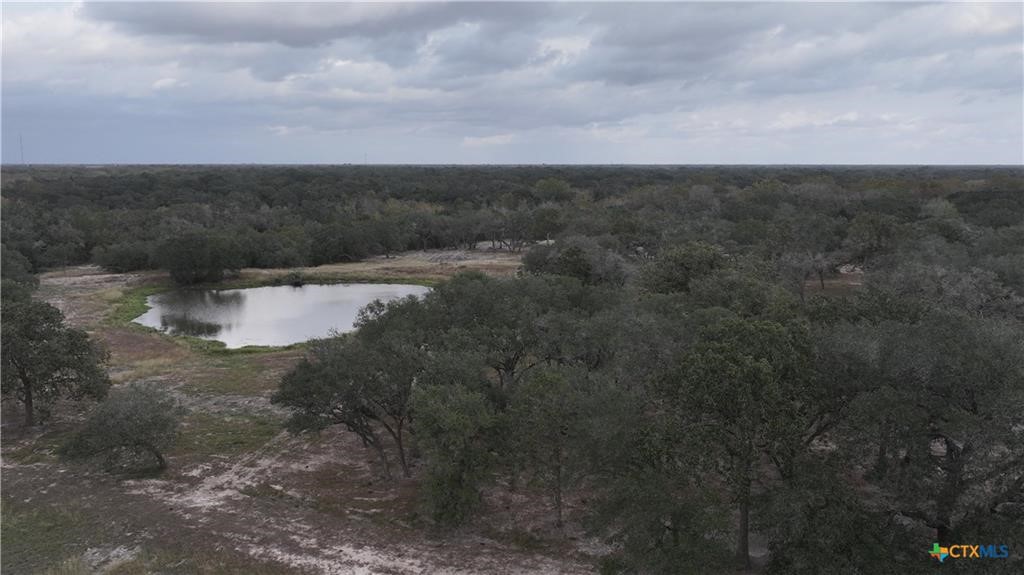 0 Garcitas Crk Rnch Road Inez, TX 77968 - Photo 7 of 13 a view of a dry yard with wooden fence