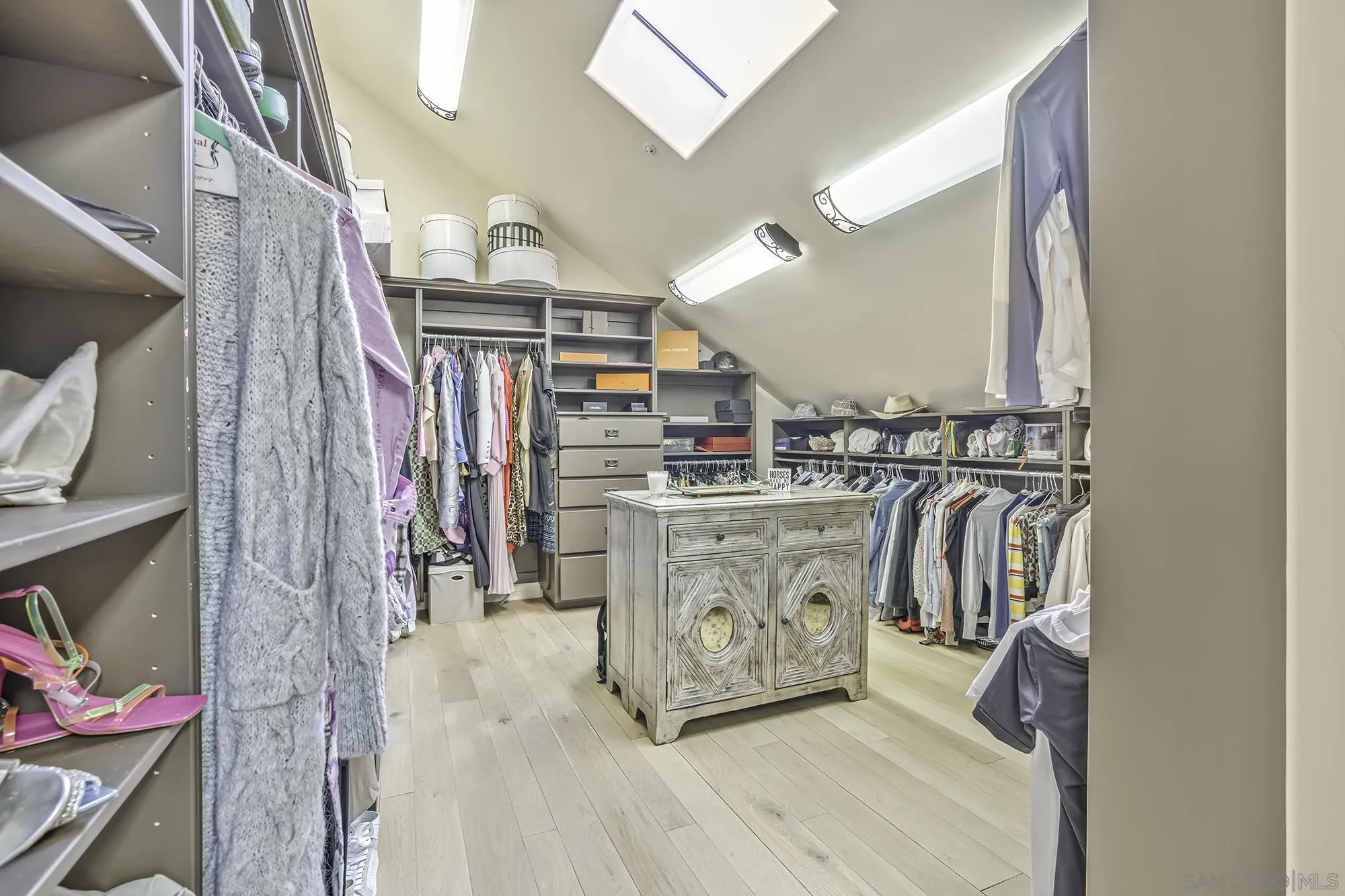 5305 La Crescenta Road Rancho Santa Fe, CA 92067 - Photo 45 of 64 2 parts of the primary walk in closet , to house the largest of wardrobes.