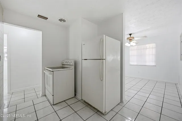 a view of a storage & utility room with washer and dryer