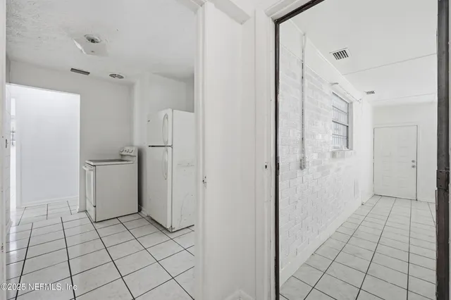 a bathroom with a shower and toilet