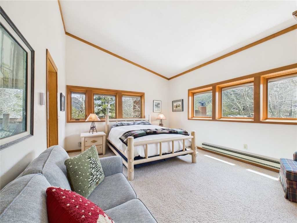 620 Tennis Club Road, Unit 1339 Keystone, CO 80435 - Photo 24 of 49 Spacious primary bedroom with vaulted ceilings and natural light