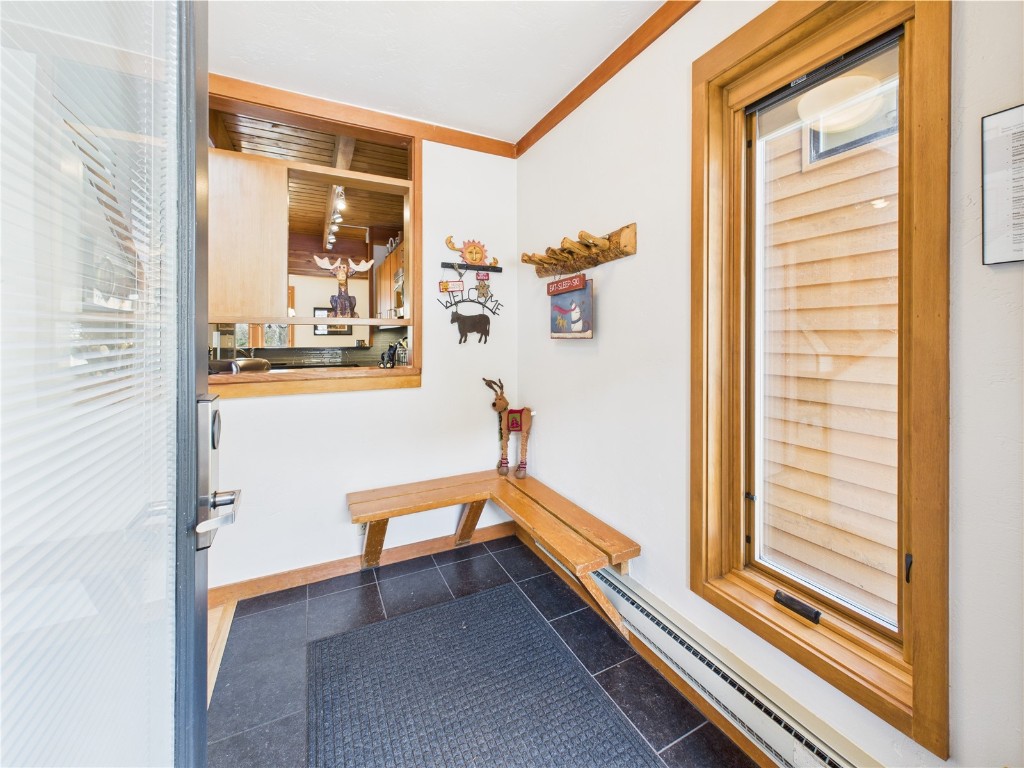 620 Tennis Club Road, Unit 1339 Keystone, CO 80435 - Photo 3 of 49 Convenient entry with bench and gear hooks for all your mountain adventures.