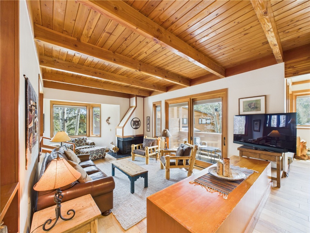 620 Tennis Club Road, Unit 1339 Keystone, CO 80435 - Photo 5 of 49 Inviting open living room with rich wood ceiling detail