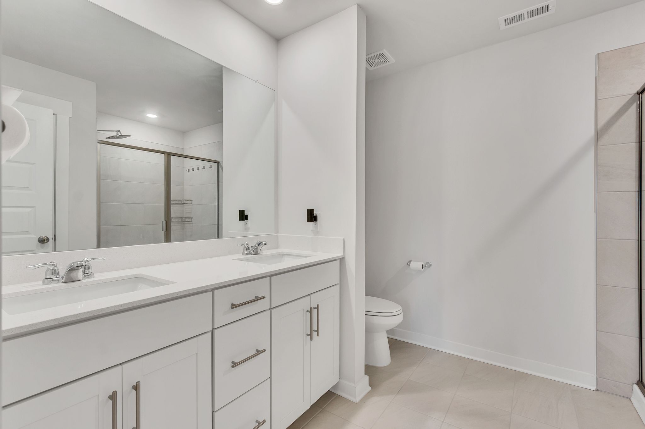 2736 Fordham Street Columbia, TN 38401 - Photo 6 of 15 a bathroom with a double vanity sink and a mirror
