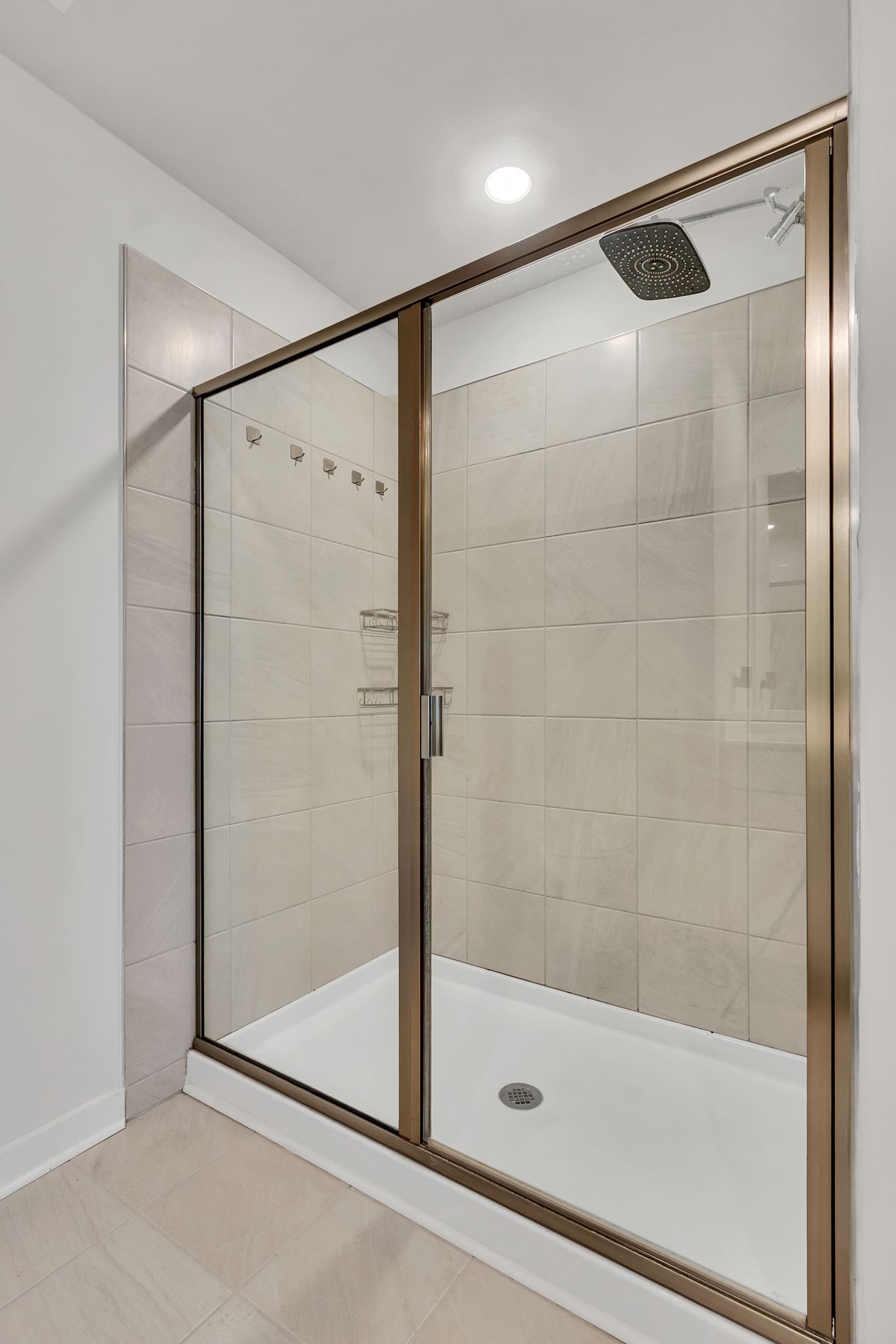 2736 Fordham Street Columbia, TN 38401 - Photo 7 of 15 a bathroom with a glass shower door