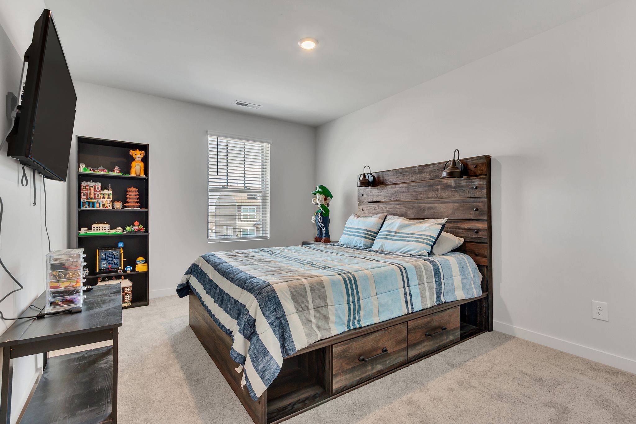 2736 Fordham Street Columbia, TN 38401 - Photo 10 of 15 a bed sitting in a bedroom next to a window